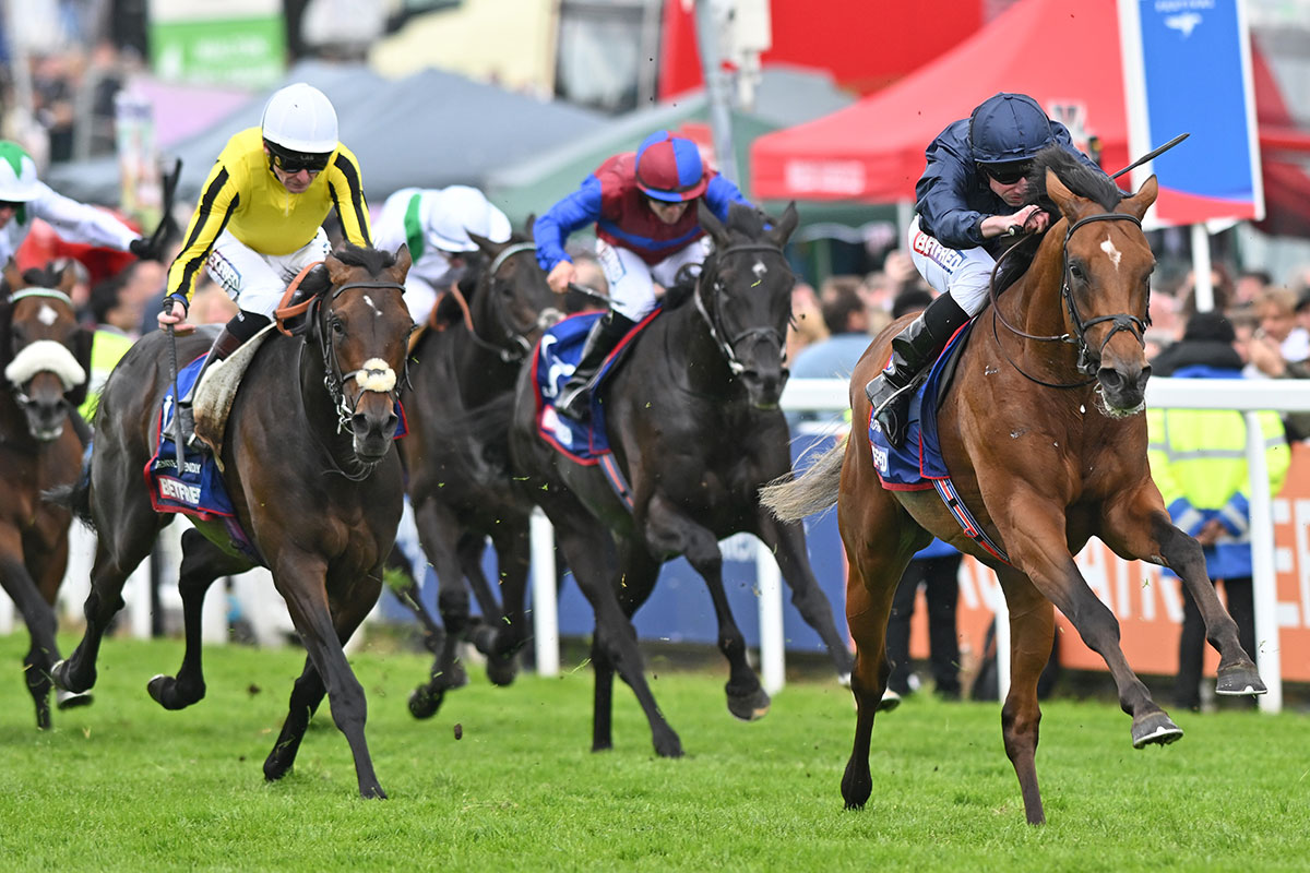 City Of Troy and Ryan Moore come clear of their rivals in The Derby at Epsom
(Credit: Focus on Racing)