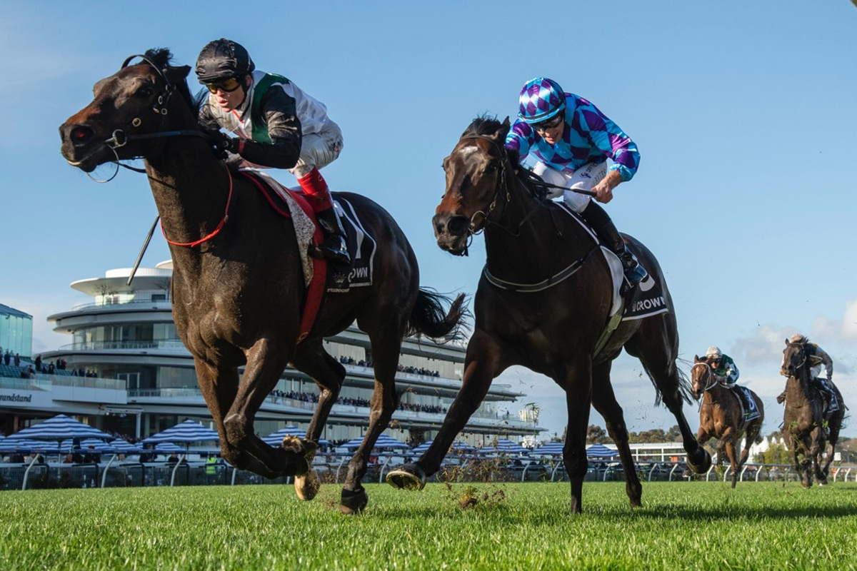 Mr Brightside runs down Pride Of Jenni to win the Group 1 Makybe Diva Stakes at Flemington. (Credit: Vince Caligiuri)